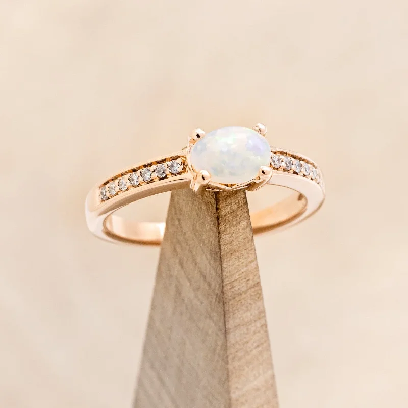 OVAL WHITE OPAL ENGAGEMENT RING WITH DIAMOND ACCENTS